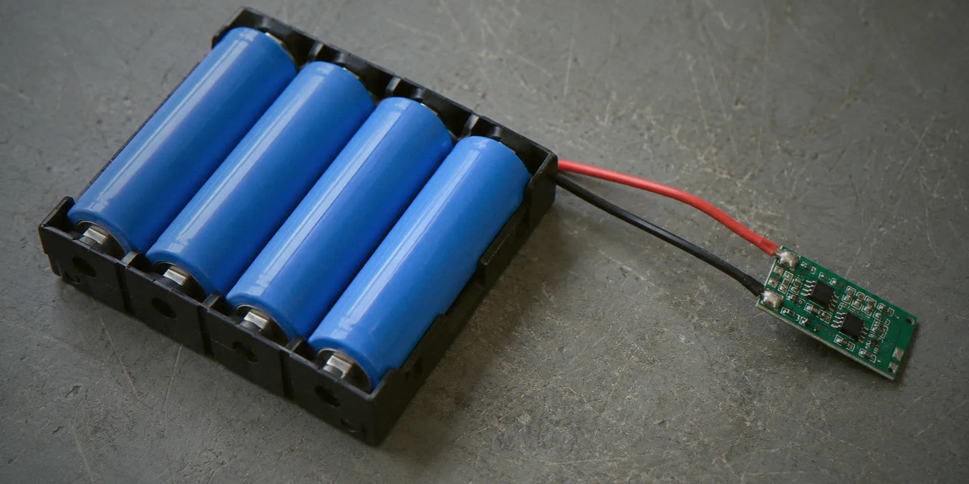 Four-cell lithium battery pack with a protection board